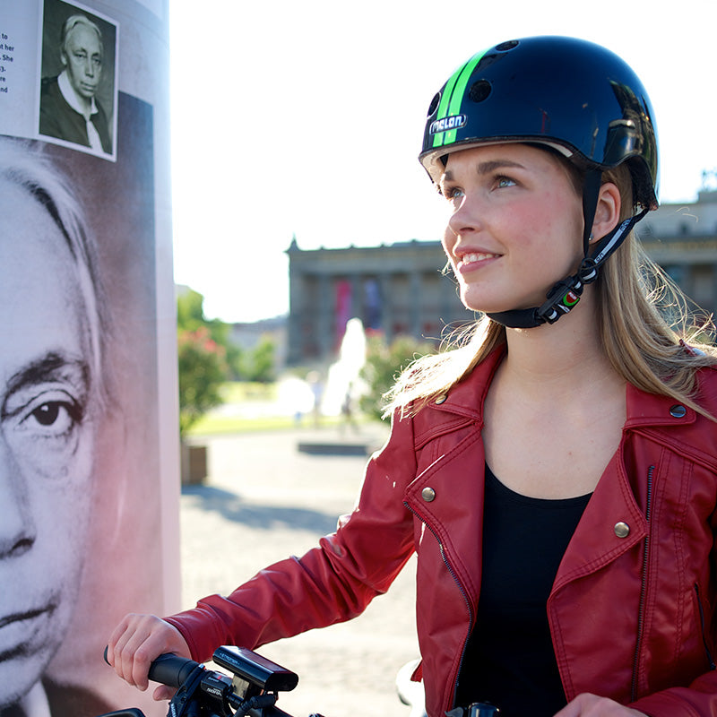 Woman wearing a black Melon Helmet
